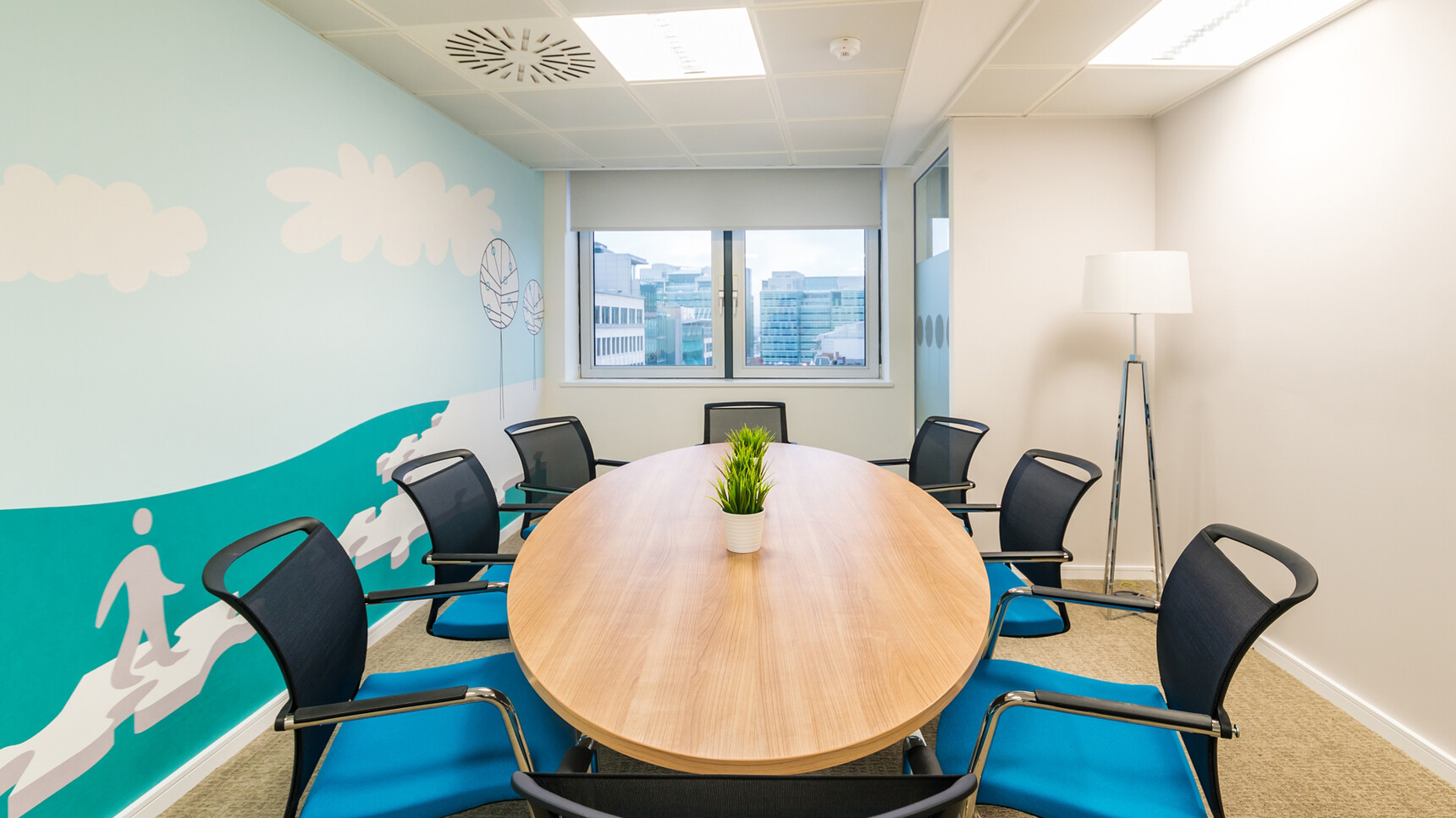 Eight Elite Moda Mesh Back Cantilever Base Meeting Chairs With Black Backrest Finish With Blue Seat Finish And Polished Chrome Base Finish At Elite Meeting Desk With Motivational Wall Mural In Meeting Room