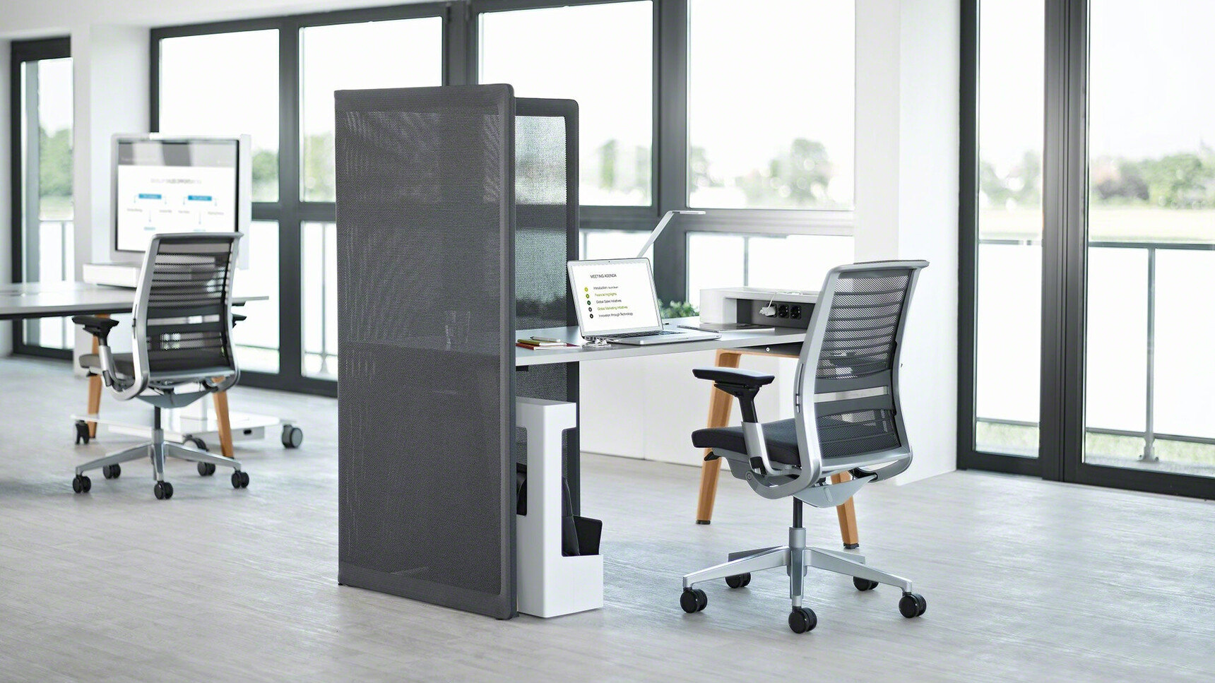 Steelcase Think 3D Knit Back Mesh Back Office Task Chair Insitu At Fixed Height Desk Rear View