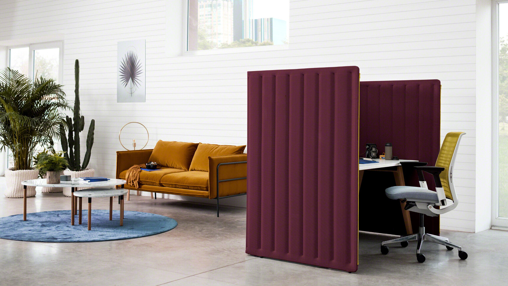 Steelcase B-Free Desk With Wooden Legs And White Table Top Finish With A Grey Fabric And Yellow Mesh Backrest Think 3D Knit Back Office Chair With Acoustic Board In Office Environment