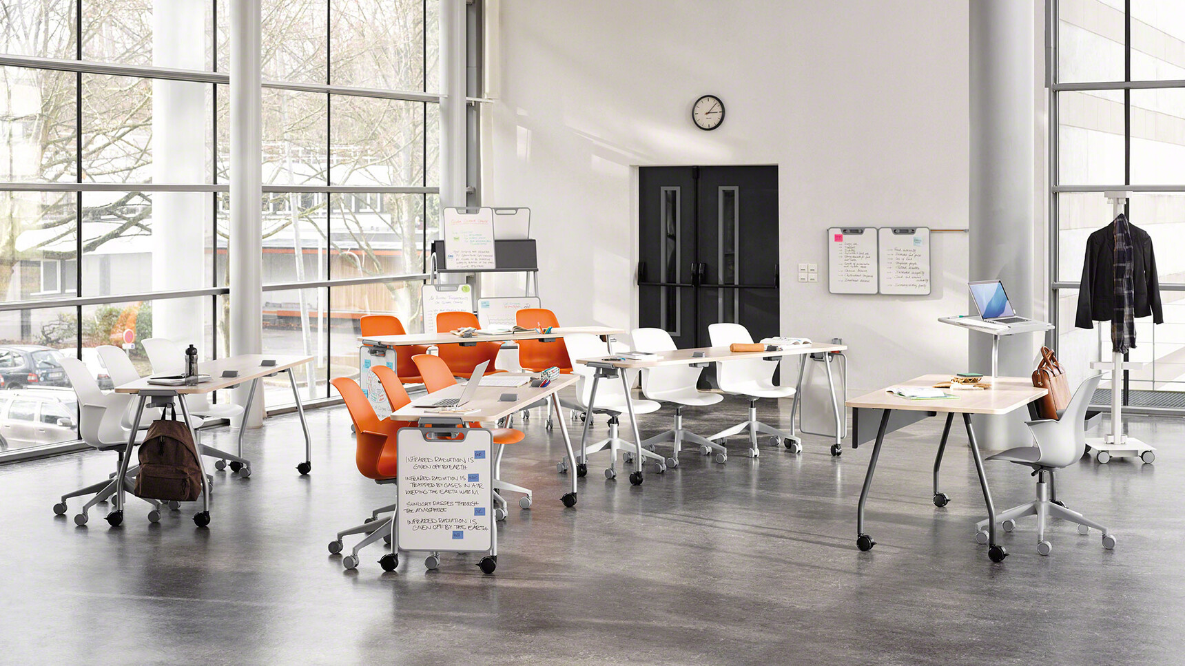 Four Steelcase Verb Rectangular Desks With Wood Table Top Finish And Grey Leg Finish On Castors Two With Optional White Board Easels With Thirteen Node 5 Star Base Chairs And One Verb Chevron for Two Desks
