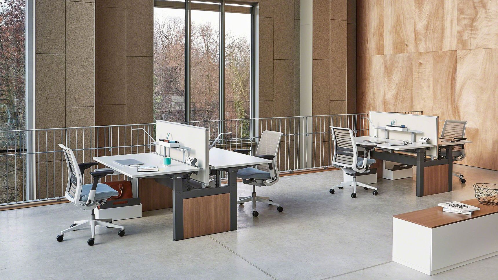 Two Steelcase Ology Height Adjustable Bench Desks With Active Touch Black Black Wood Leg White Top White Privacy Screens Four Blue Think 3D Knit Back